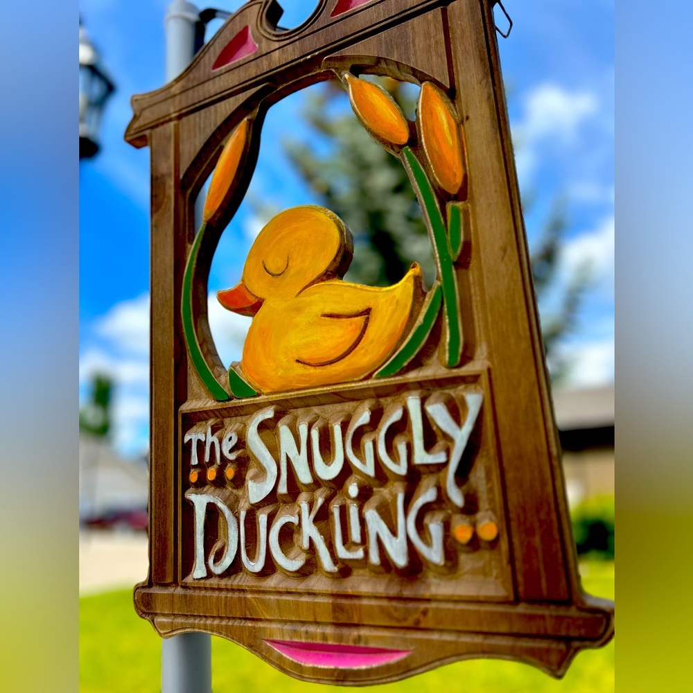 Snuggly Ducking inspired hanging sign